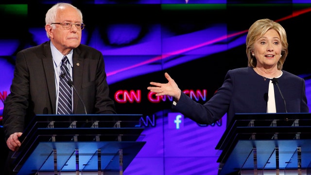 Clinton and Sanders dominate spotlight in first debate
