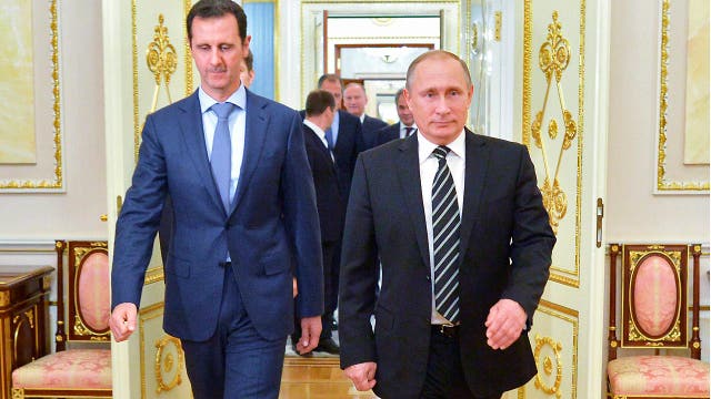 White House criticizes Moscow's warm reception for Assad