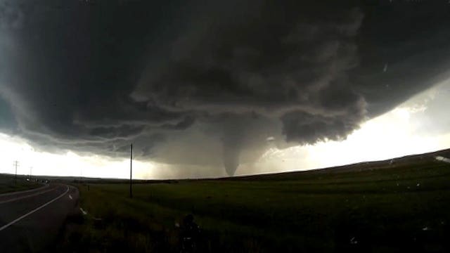 Dramatic time-lapse footage of supercell tornado touchdown