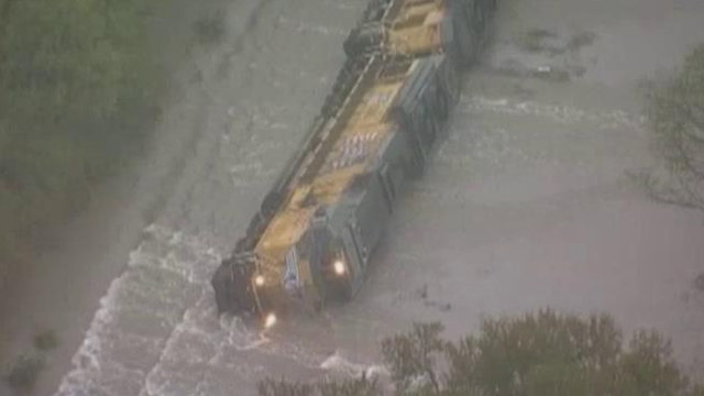 Freight train derails in Texas after flood washes out tracks
