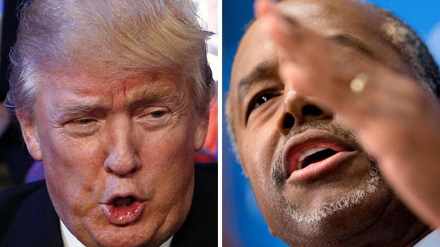 Carson's poll rise sets up debate confrontation with Trump