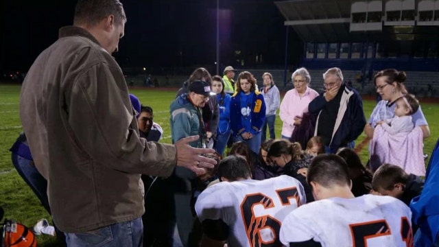 Football coach suspended for continuing post-game prayer