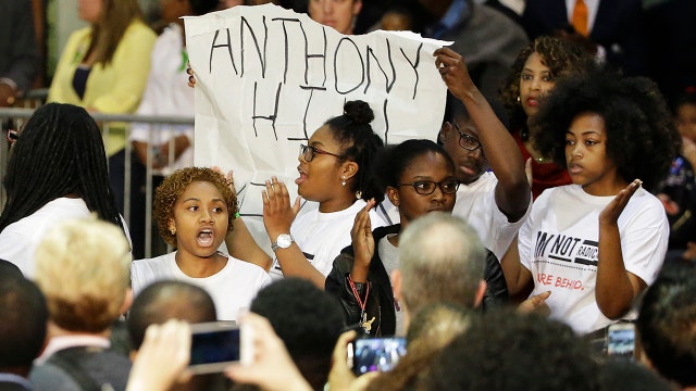 'Black Lives Matter' protesters interrupt Clinton event