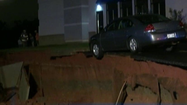 Massive sinkhole swallows fifteen cars in Mississippi