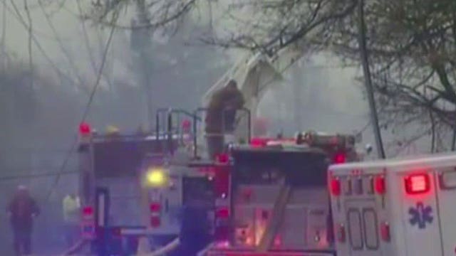 Small jet crashes into apartment complex in Akron, Ohio