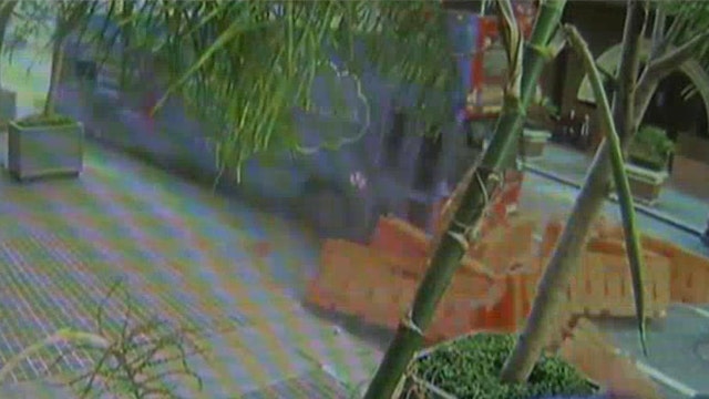 Out-of-control tour bus crash caught on surveillance video