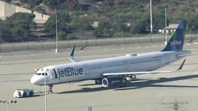 Search at LAX for man dressed as pilot near JetBlue flight