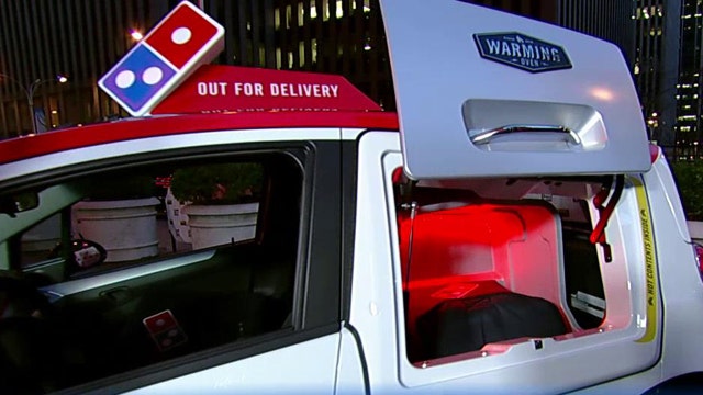 Domino's DXP vehicles cook and deliver hot pizza