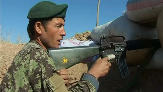 Afghan forces under siege in southern province of Helmand