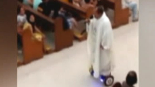 Priest suspended for hoverboard ride during Mass
