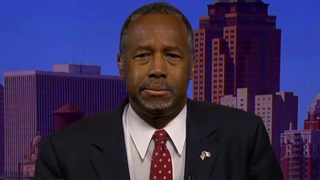 Carson: Anyone who accepts American values is welcome here
