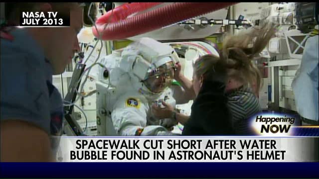 Spacewalk cut short after water bubble found in helmet