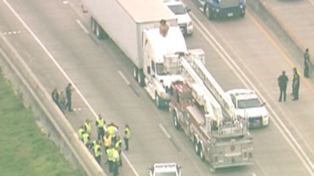 Naked woman brings traffic to standstill on Texas freeway