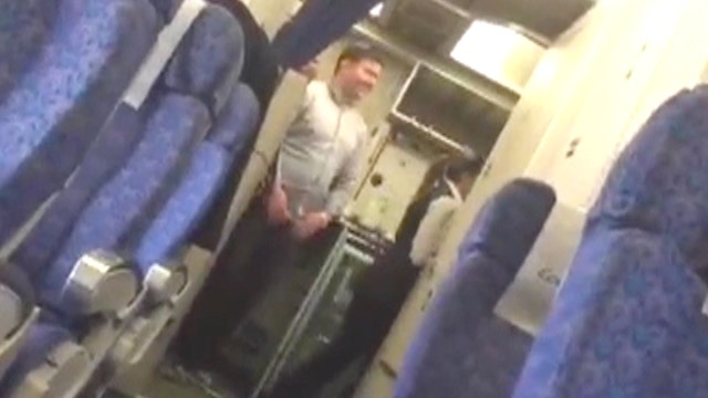 Passenger captures video of hostage taking pic with hijacker