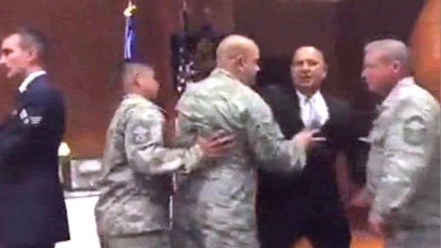 Retired airman forcibly removed from retirement ceremony