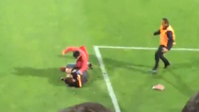 Chaos on the pitch: Fan invades field, attacks referee 