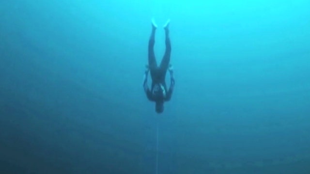 Watch freediver break world record in insane 400-foot plunge