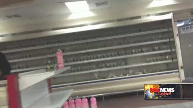 Hungry Venezuelans find empty supermarket shelves