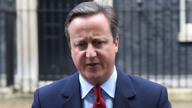 Cameron caught on hot mic after resignation announcement