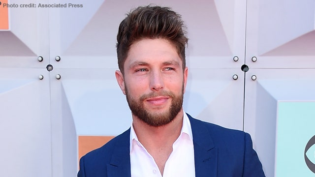 Country Singer Chris Lane Made a VERY Famous Fan