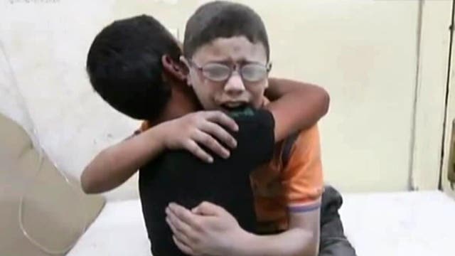 Tragic video of Syrian boys grieving over killed brother