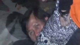 Couple reconstructs murder of Indonesian police officer at a Bali resort, British DJ David Taylor reenacts how he bashed officer in the head with a beer bottle