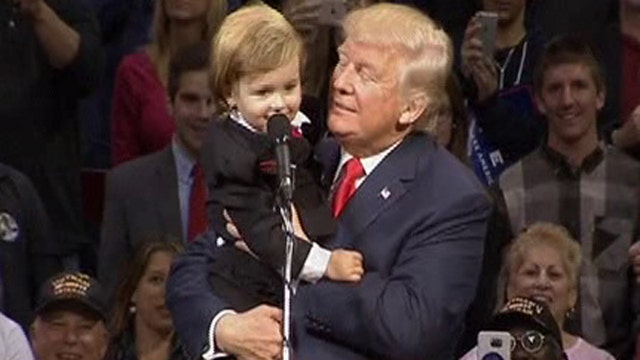 Pint-sized doppelganger joins Donald Trump on stage