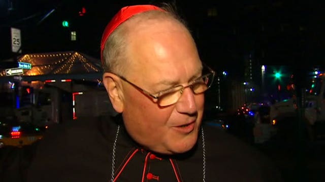 Cardinal Timothy Dolan reacts to Al Smith dinner