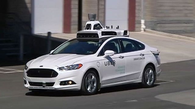 Uber accelerates toward self-driving cars