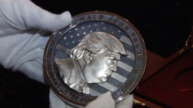 Russian company creates 'In Trump We Trust' coin