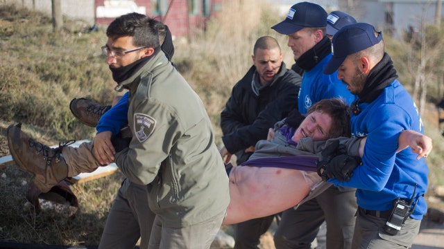 Evictions of West Bank settlers met with violent protests