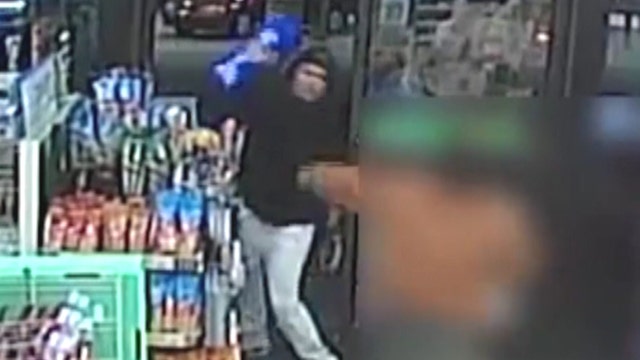 Thieves throw case of beer at store clerk