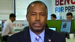 Carson cuts campaign staff amid cash crunch, vows to stay in race