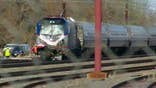 2 dead after Amtrak train strikes backhoe on tracks near Philadelphia