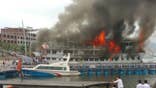 Cruise ship passengers jump for their lives to escape blaze