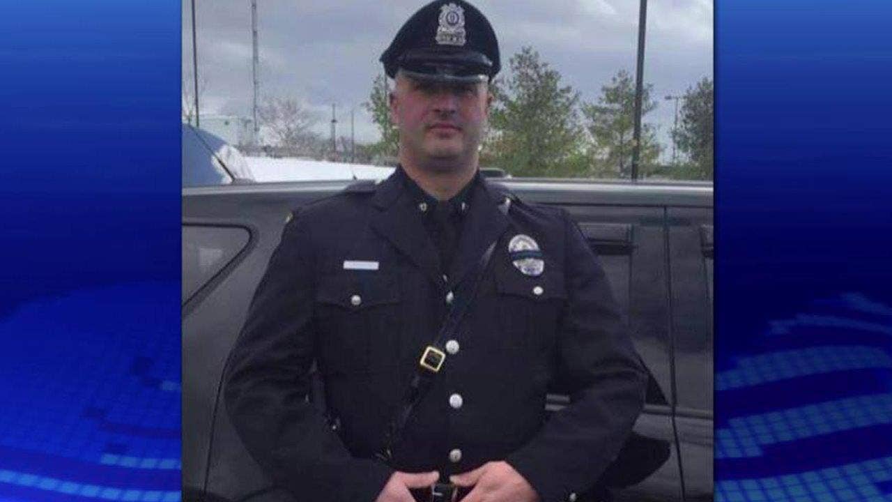 Massachusetts officer killed in traffic stop was shot in the back, officials say