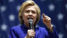Clinton casts Trump as dangerous ? this time, on the economy