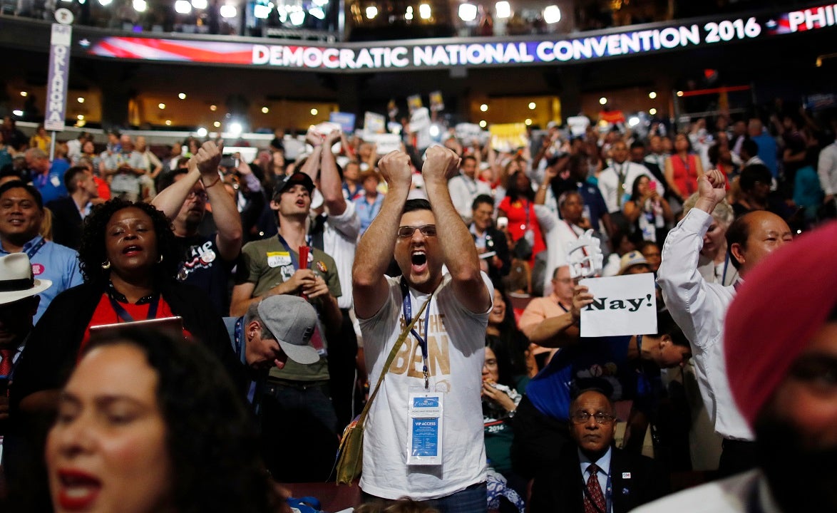 Clinton faces storm warnings inside and outside convention hall