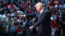 Trump walks back email hack comments, but damage lingers