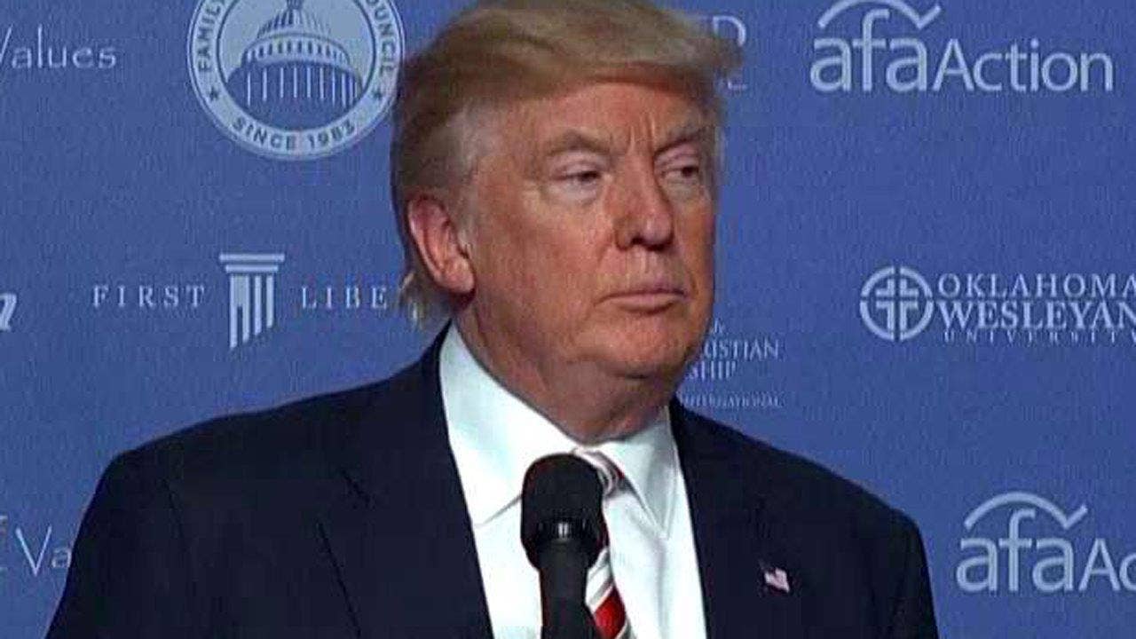 Trump reaches out to faith voters, as candidates spar on security