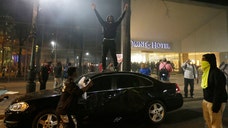 Charlotte faces aftermath of protests ignited by fatal police shooting; 16 officers injured