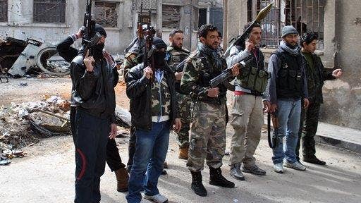 Syria's military to reduce airstrikes for Aleppo evacuations