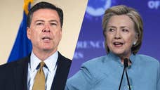Justice Department to Continue Work With FBI on Clinton Email Review