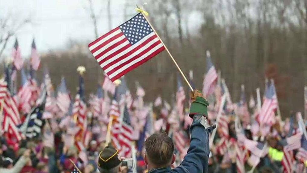 Town takes stand after mayor forced to remove Christian flag