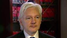 Trump, Palin break with GOP, warm up to Assange