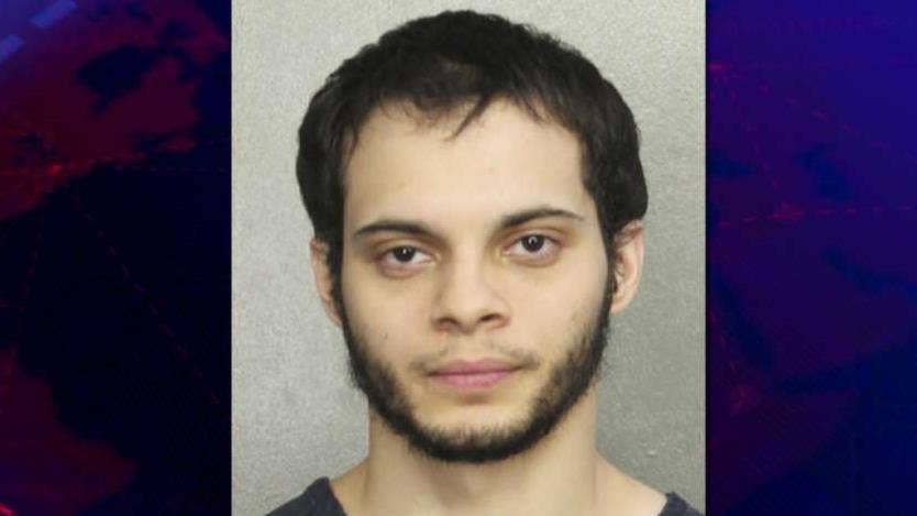 Accused Fort Lauderdale airport shooter twice had guns confiscated