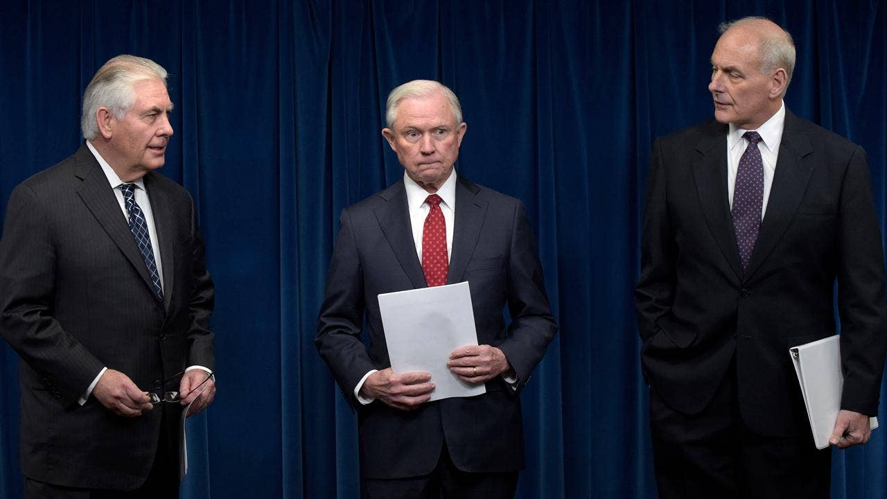 Trump signs new immigration order, narrows scope of travel ban