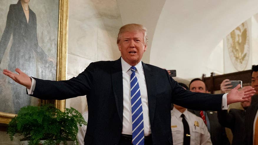 President embraces student, tells group to 'work hard'