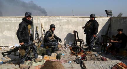 Mosul's ISIS-held neighborhoods surrounded, official says
