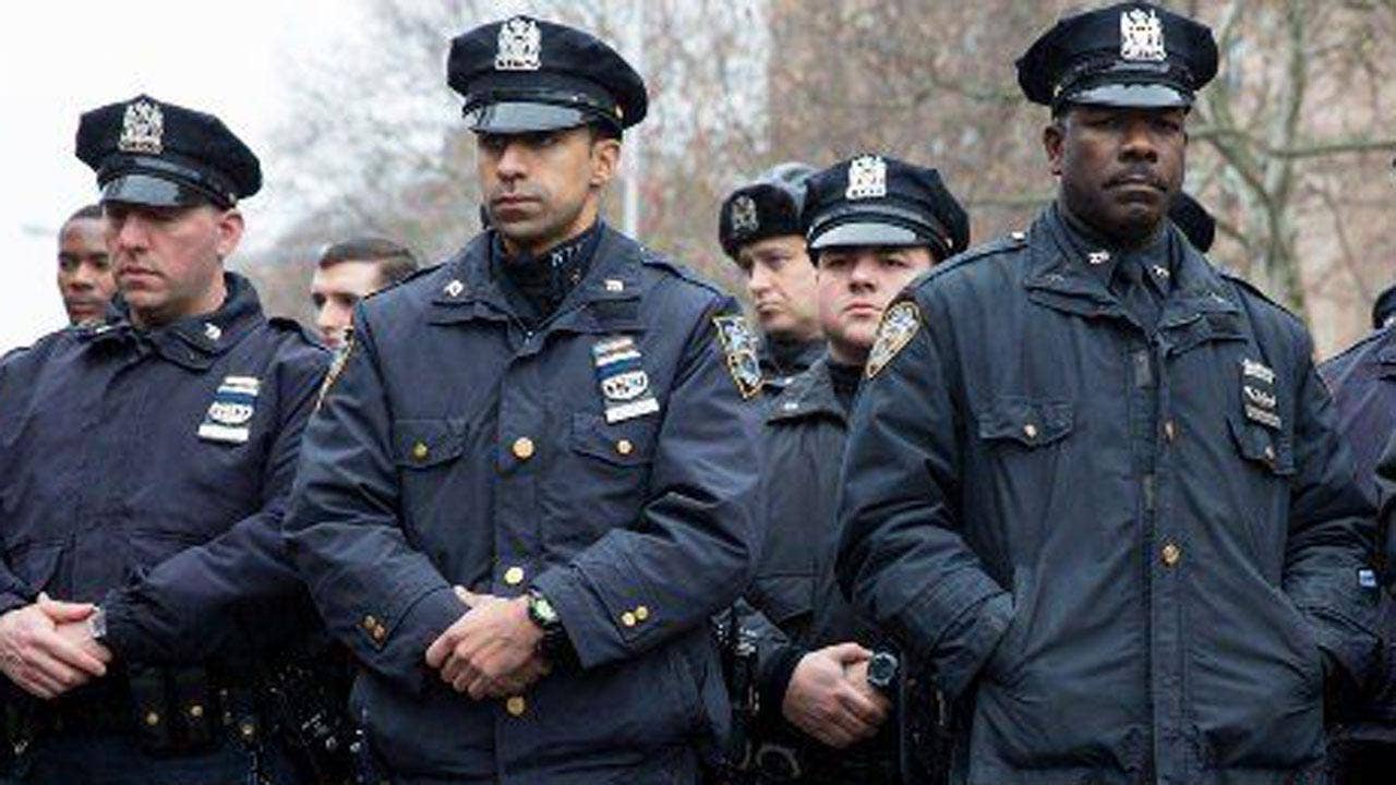 President Trump said he was “very happy” to sign into law two bills to provide help law enforcement officers and veterans.